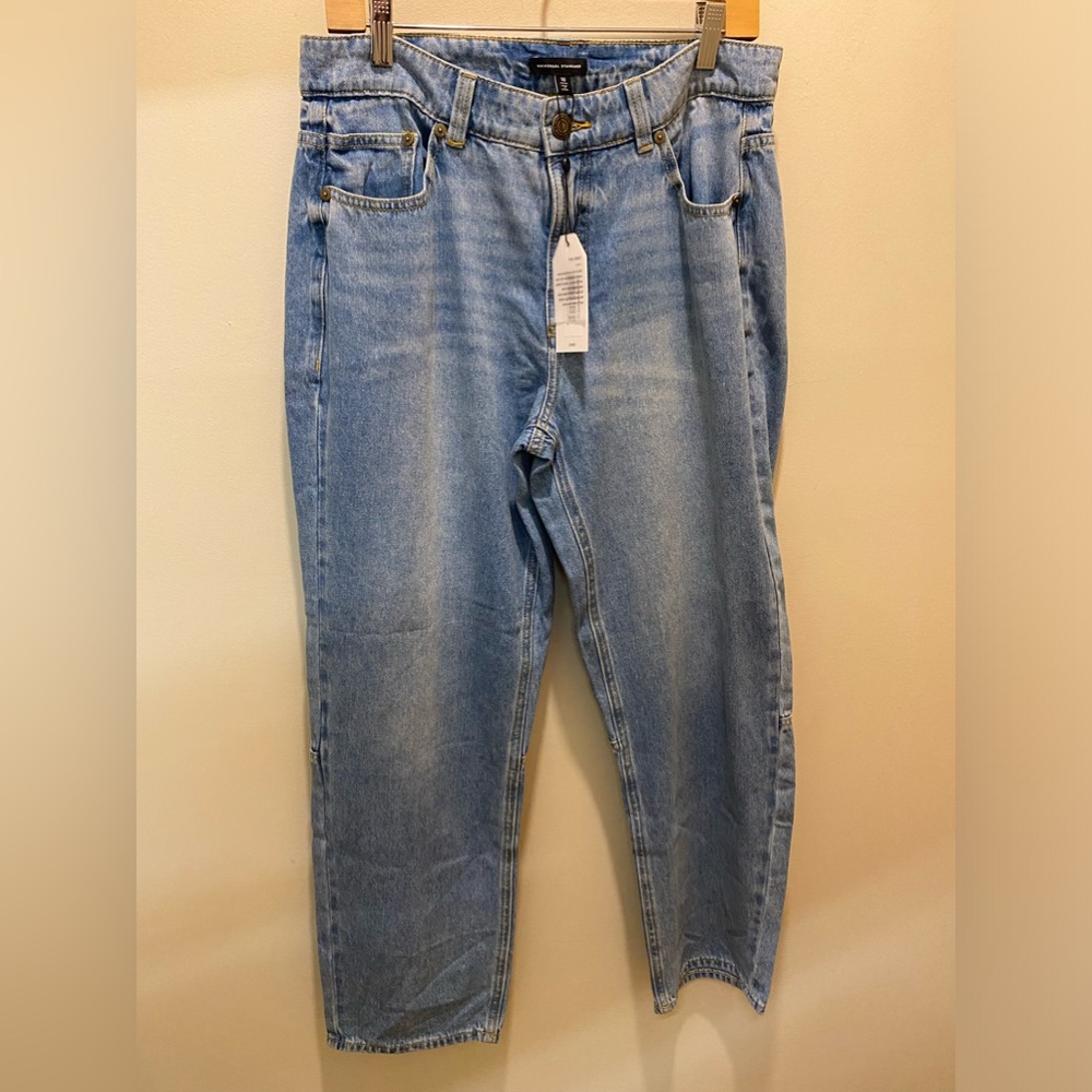 UNIVERSAL STANDARD straight leg fade out jeans.
